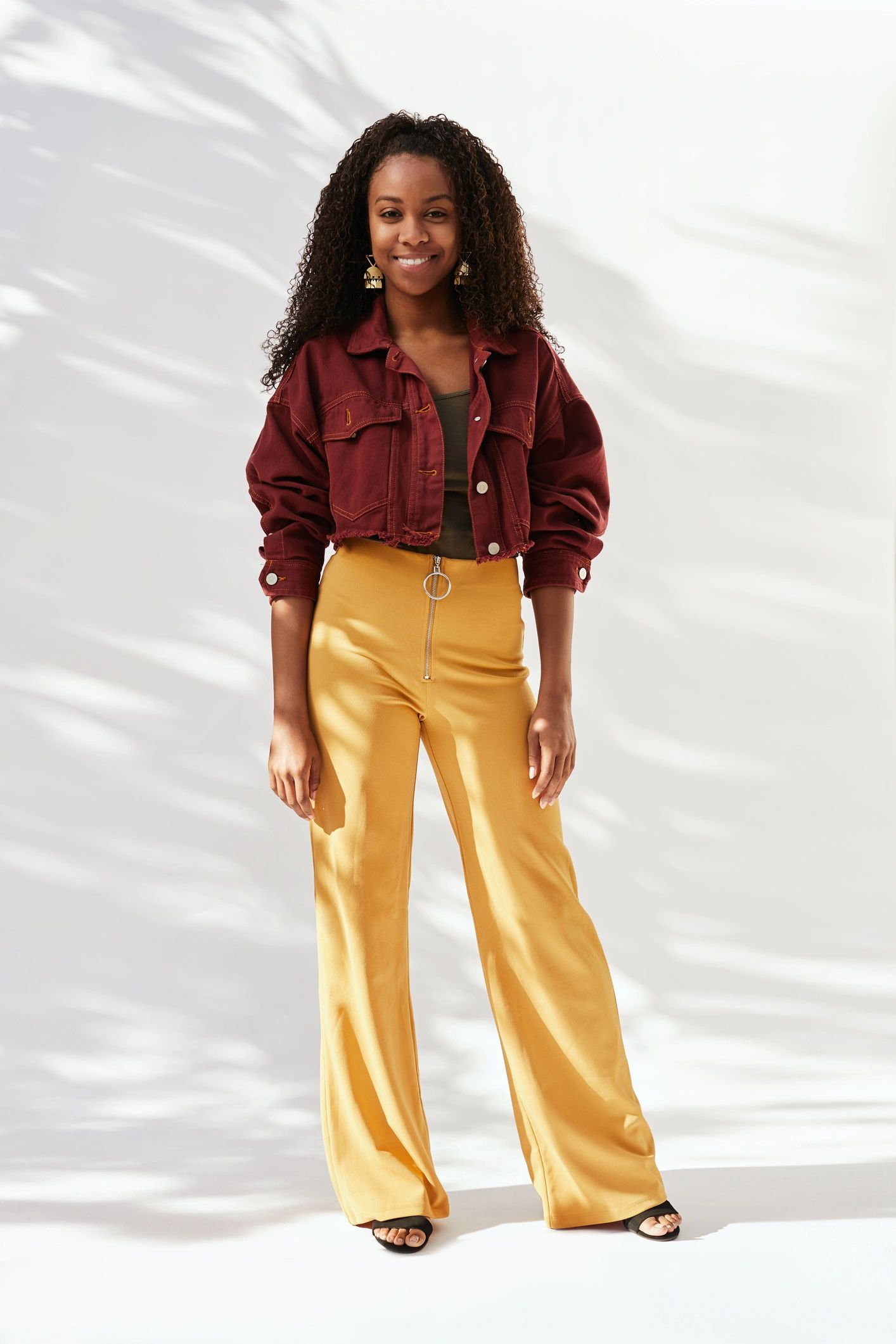 Fashionable woman in a stylish jacket and pants
