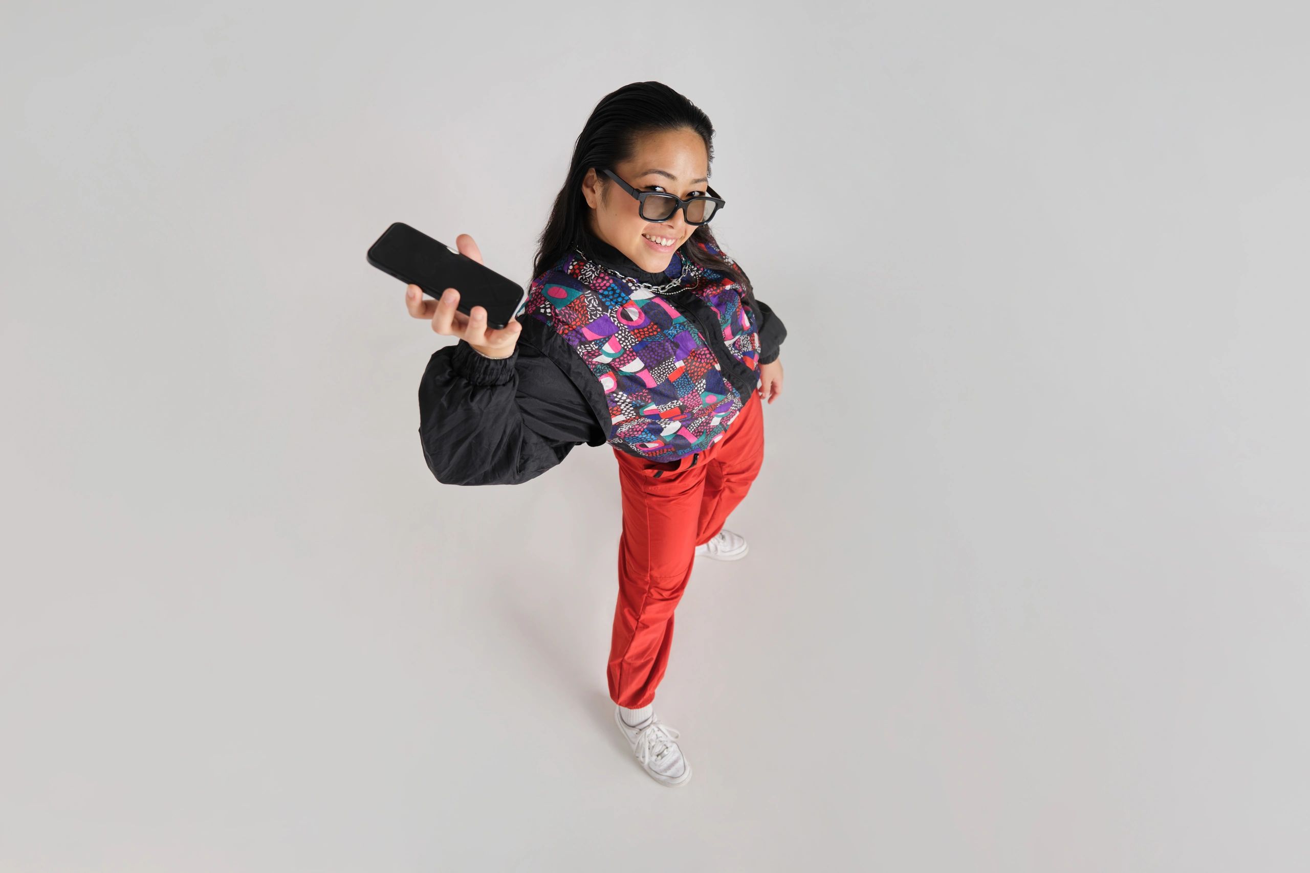 Fashion-forward woman in colorful streetwear